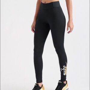 Nike black & gold leggings